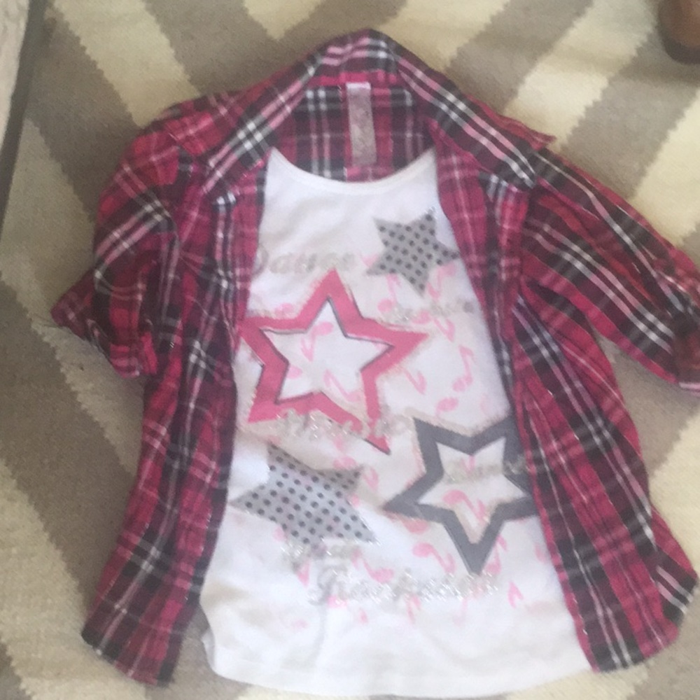 Half sleeve star shirt.  The size is 10/12.